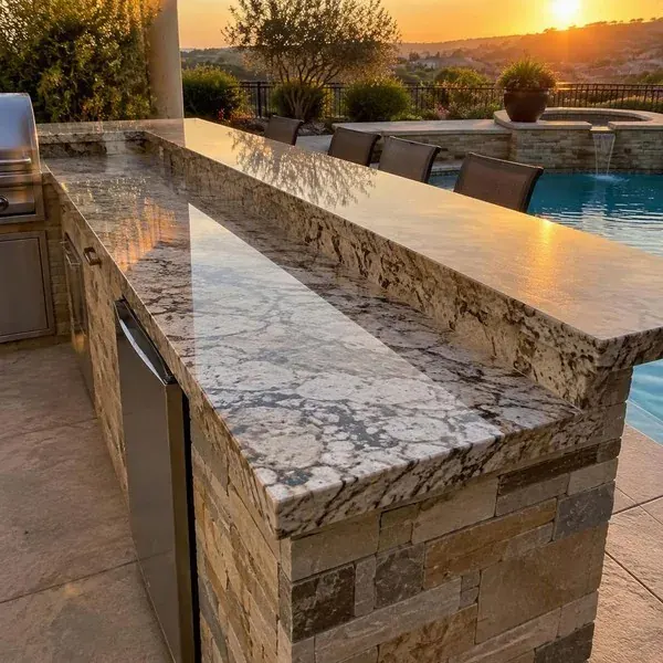 Poolside outdoor countertop Poolside outdoor stone countertop in late afternoon sun on an Anne Arundel County waterfront property