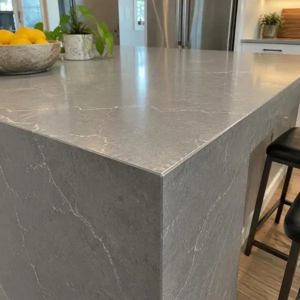Stone countertop edge rebuilt and polished at an outside corner after a chip repair in Baltimore