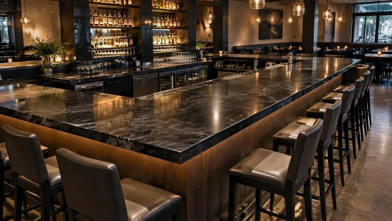 Stone restaurant bar top countertop running the length of an empty Baltimore dining room before opening